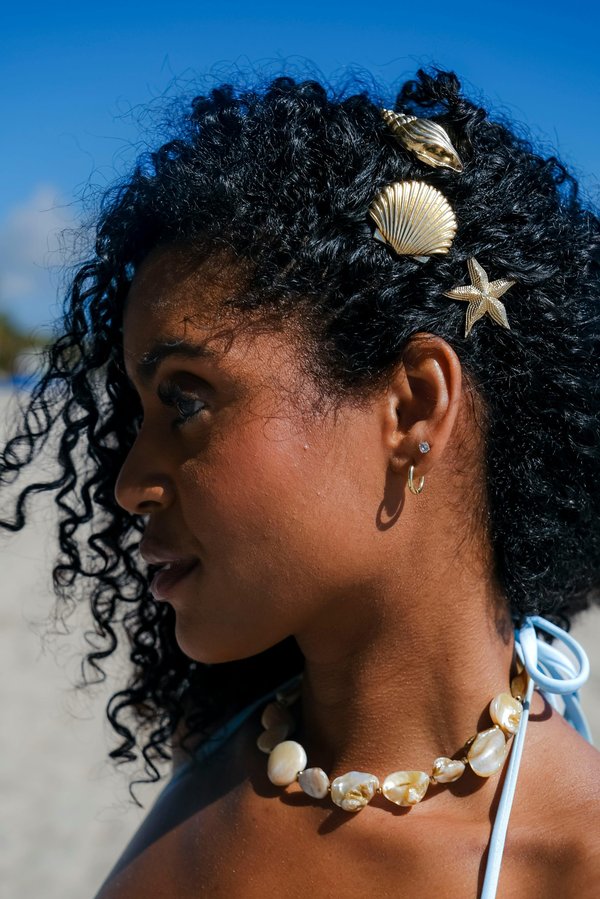 Discover unique handmade shell jewelry that inspires ocean love